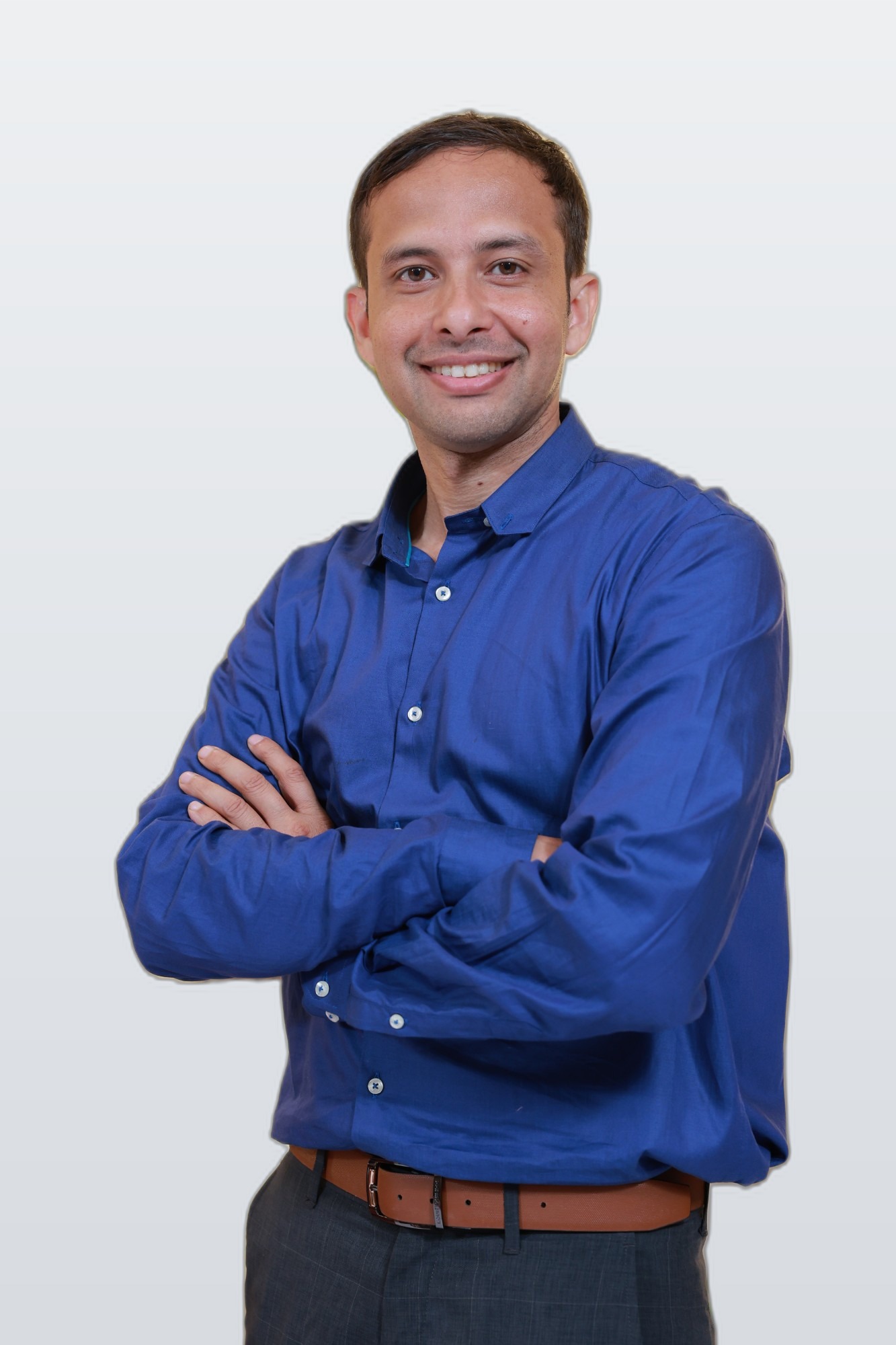 Dr. Midhun Valiya Parambil, physiotherapist in Bangalore, smiling